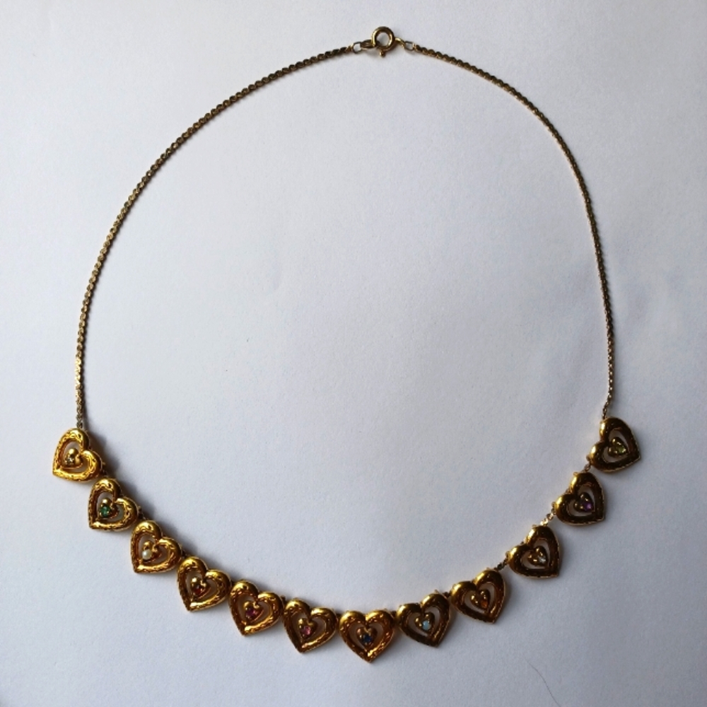 Vintage 1985 Franklin mint sterling with gold vermeil 12 heart charm necklace